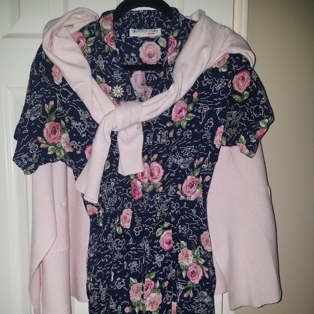 Navy floral romper with flared shorts